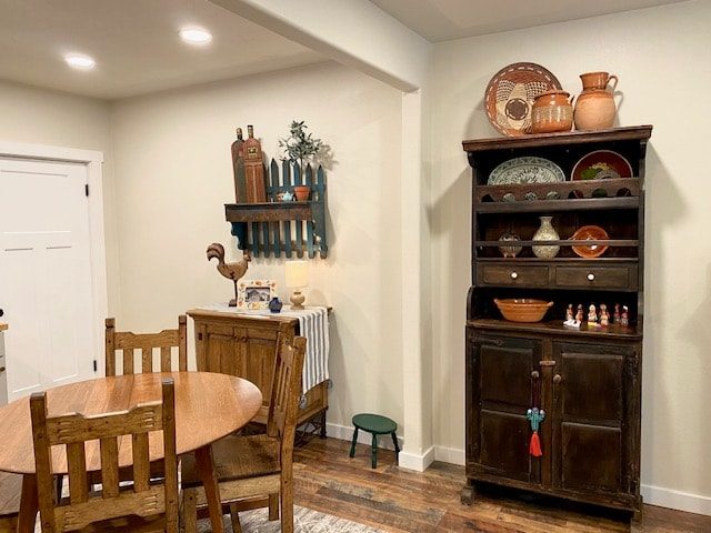 Dining table and hutch with pottery